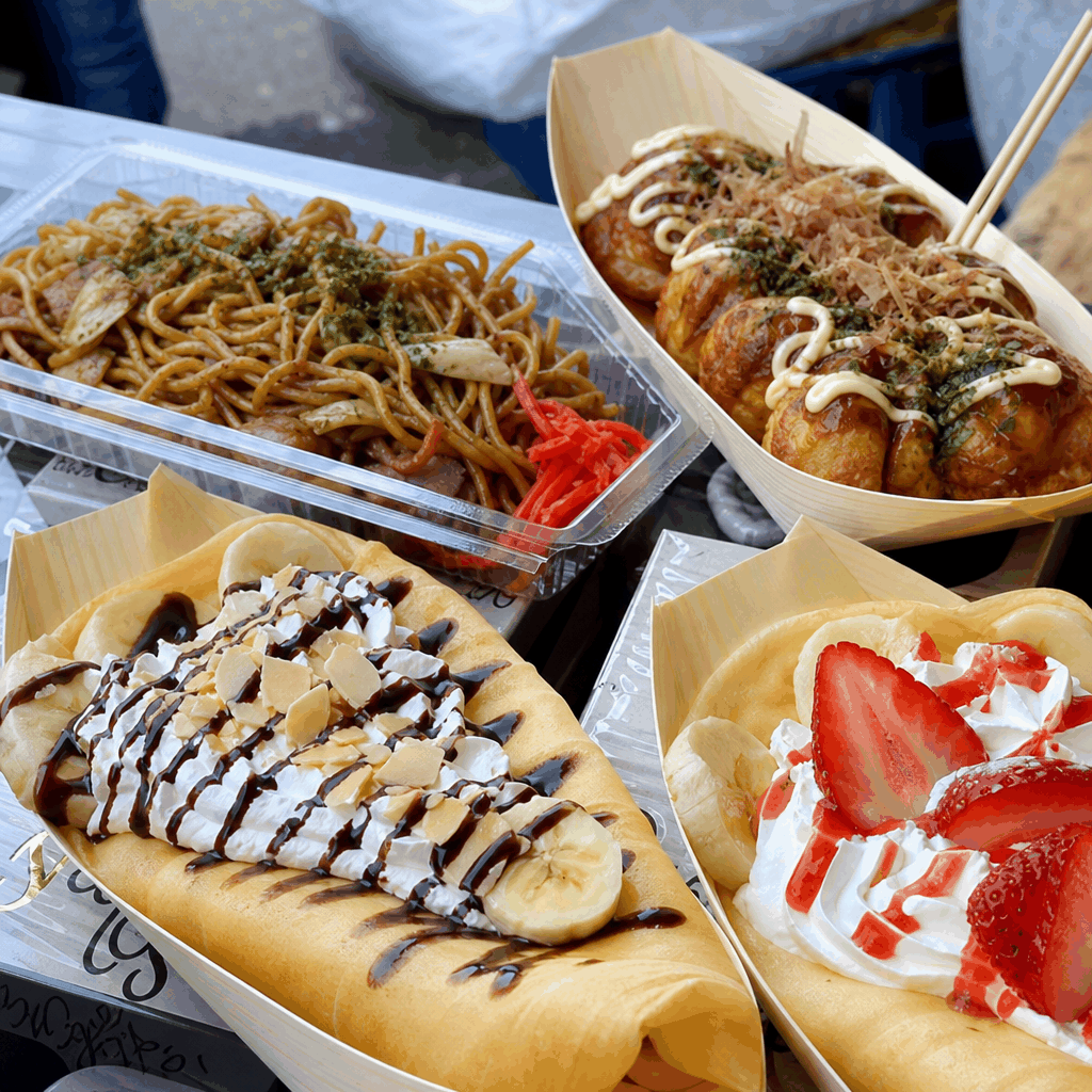 Visitors eating snack food at a Tokyo flea market