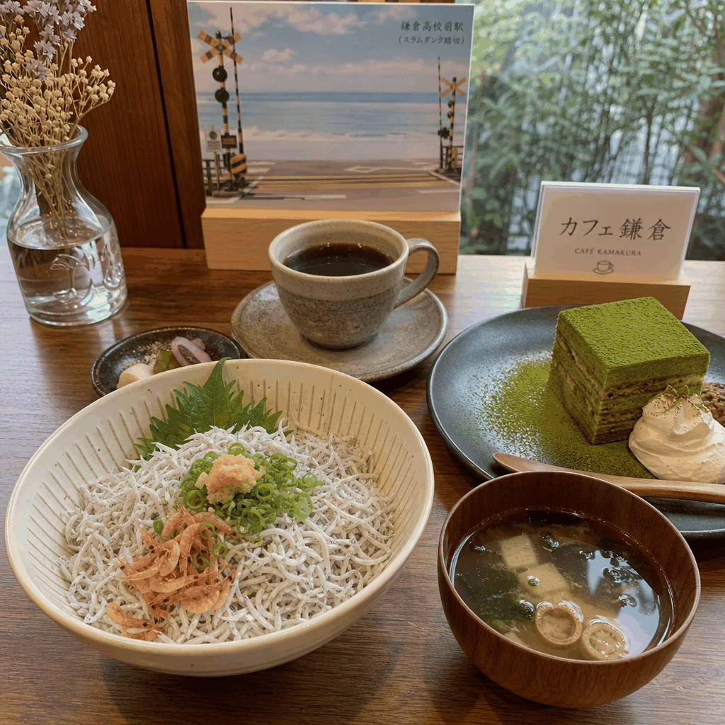 A Kamakura café or shirasu meal stop near the coast after visiting the anime landmark