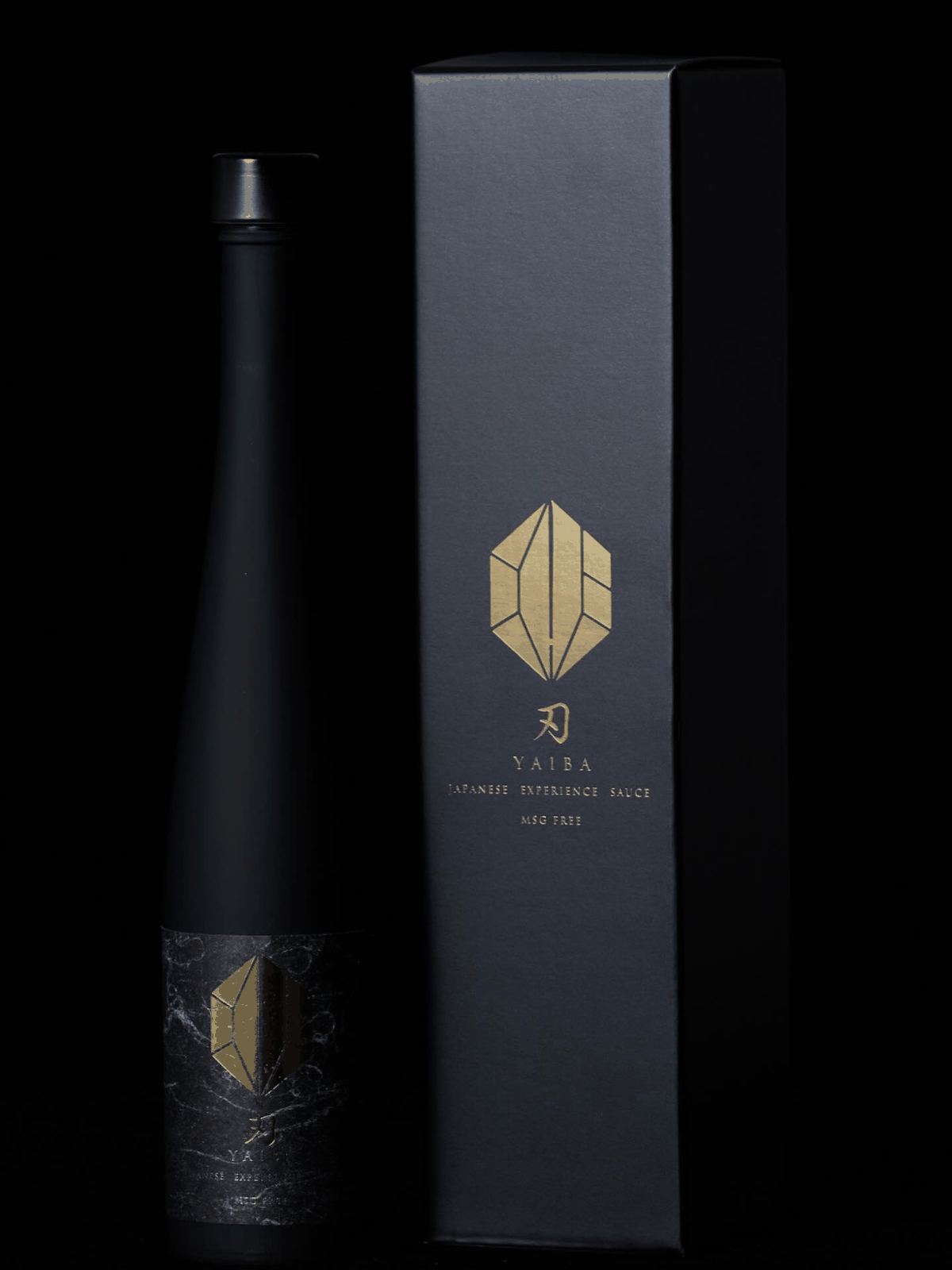 YAIBA premium Japanese sauce bottle beside its black gift box on a dark background